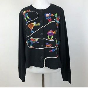 Christina Rotelli ice skating snowman sweater